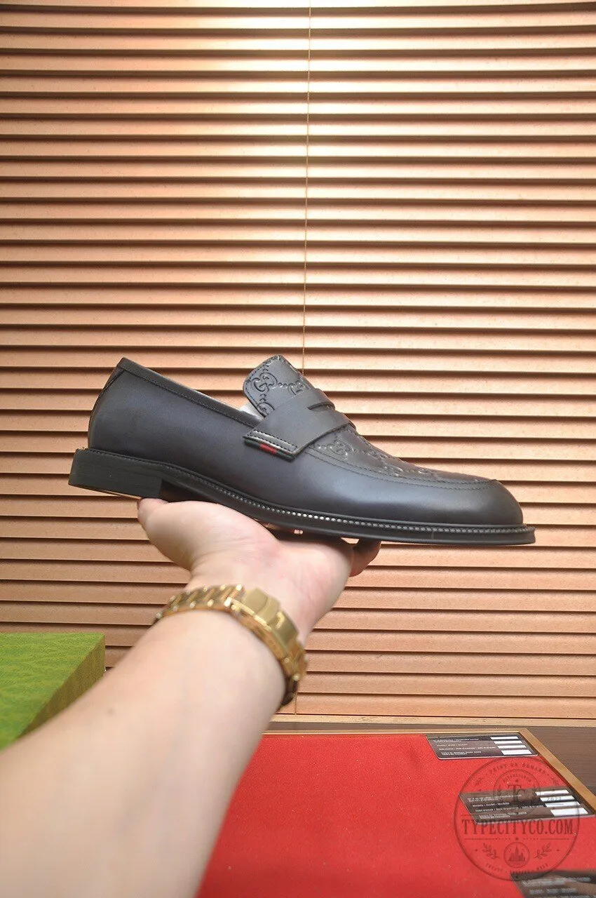 Gucci Black Leather Loafers with Embossed Logo for Men 8 Gucci Black Leather Loafers with Embossed Logo for Men